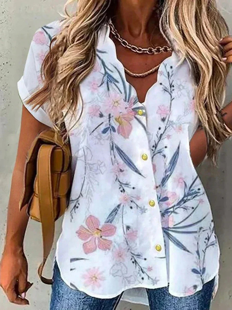 Bernice | Blus Blommig – V-ringning och Romantiska Detaljer 