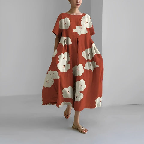 Dorothée | Pitkä Kuvioitu Mekko – Väljät ja Muodikkaat Leikkaukset 