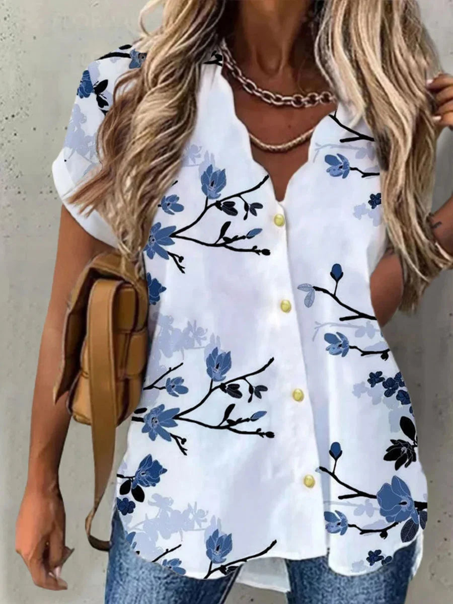 Bernice | Blus Blommig – V-ringning och Romantiska Detaljer 